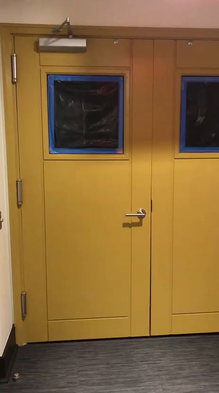 Commercial doors and frames painted in bold yellow