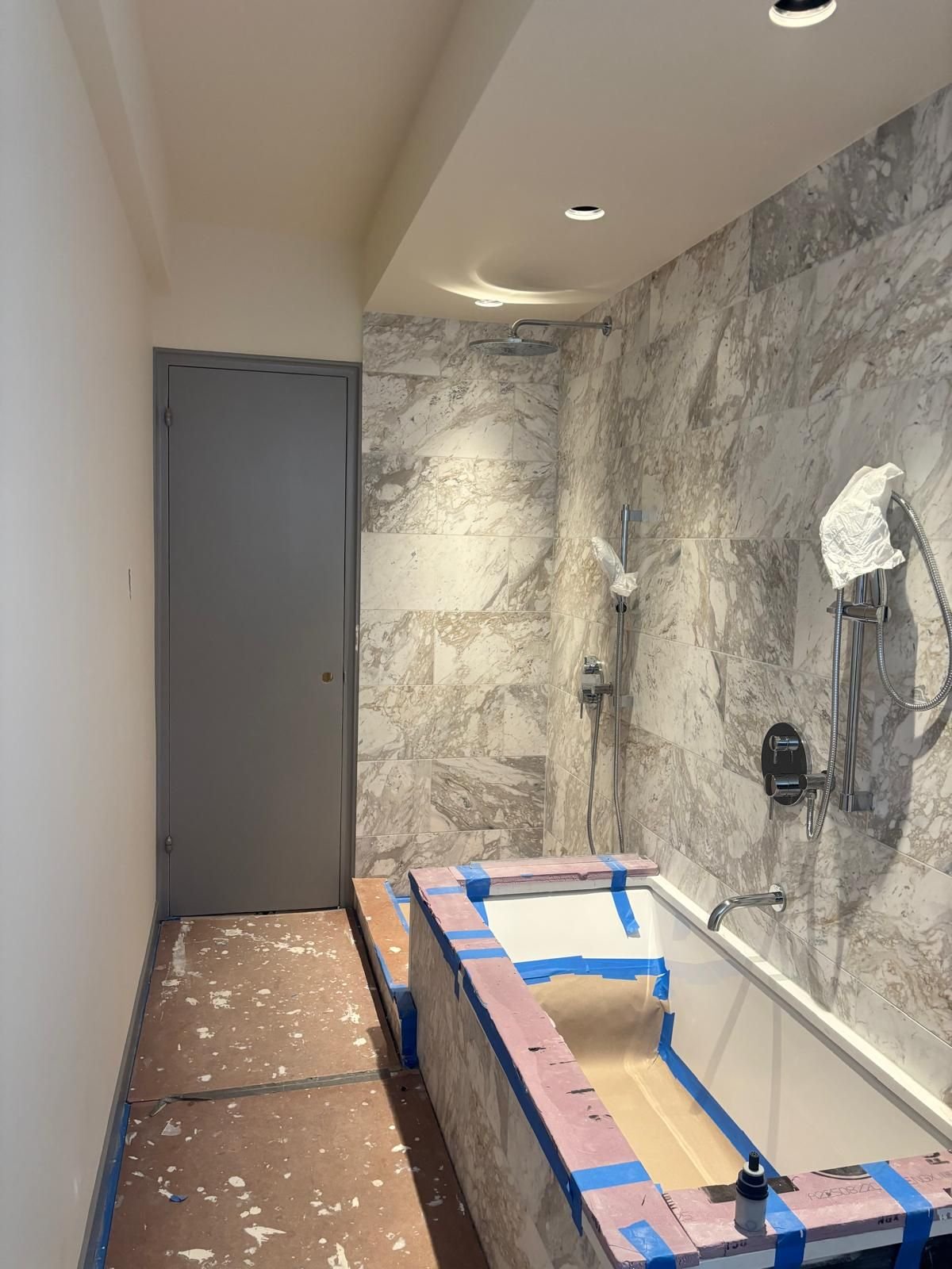 Marble bathroom protected for door and wall painting