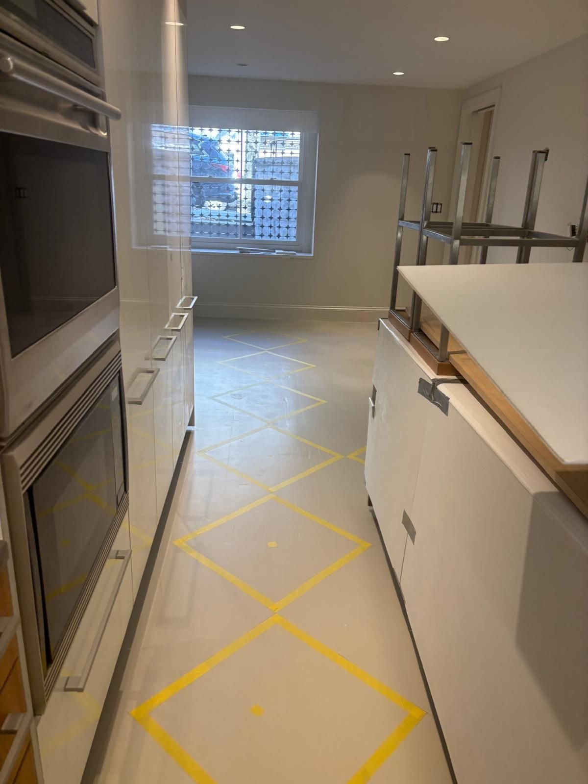 Diamond floor pattern laid out in a kitchen